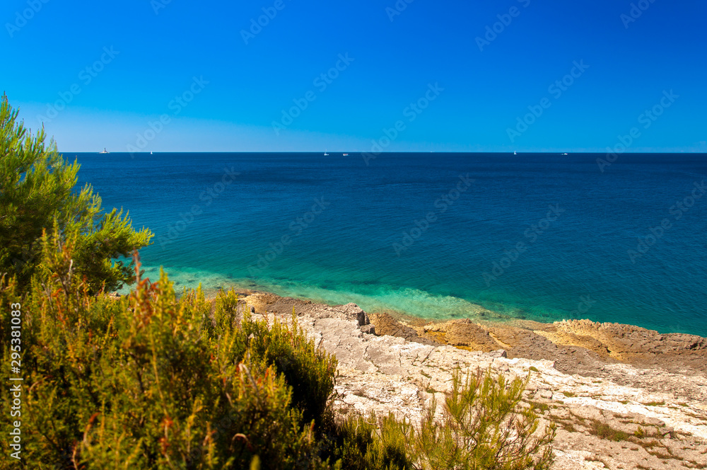 Mediteranean sea coast landscape, blue clear sky and sea.