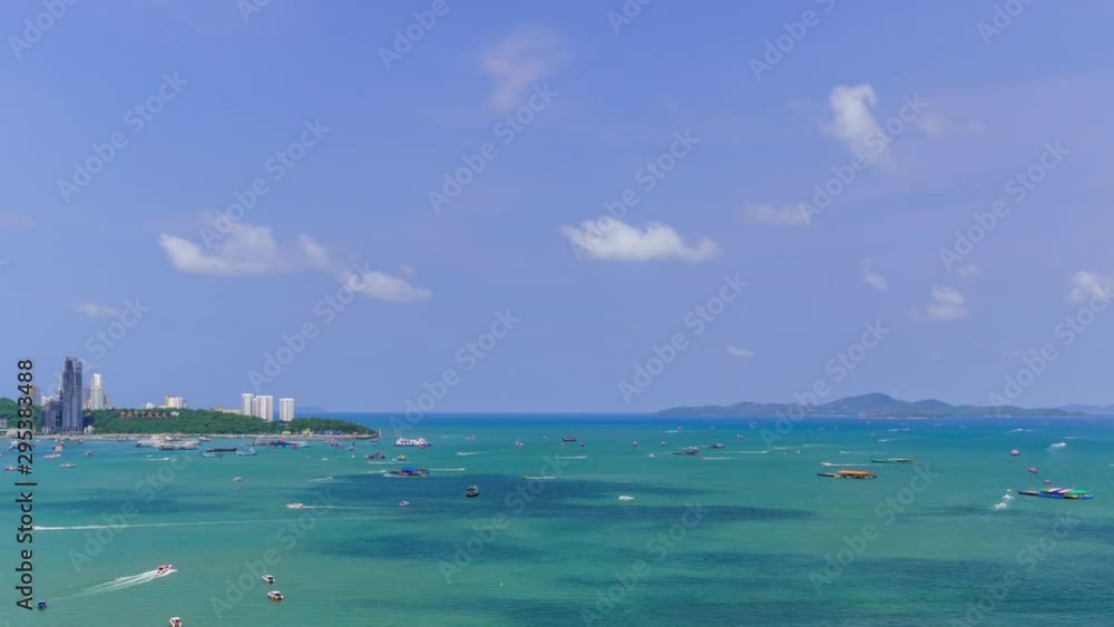 Time-lapse: Pattaya bay beach harbor and Ko Lan (Coral Island) in sunny day, Chonburi, Thailand; pan right. Time-lapse: Pattaya bay beach harbor and Ko Lan (Coral Island) in sunny day, Chonburi, Thailand; pan right.