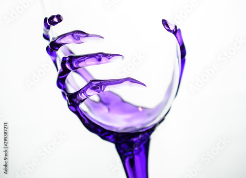 Cool Novelty Wine Glass with Transparent Purple  Skeleton Wrist and Hand making up the Stem and Gripping Bowl