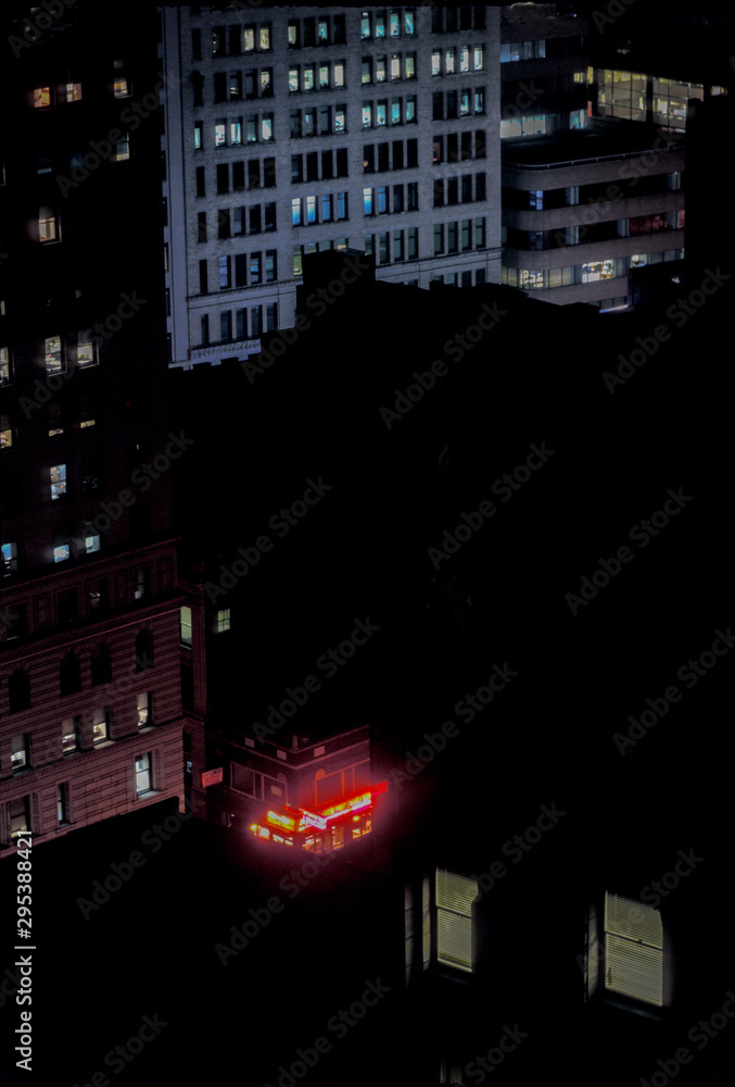 High angle view of deli sign in Wall Street area at night