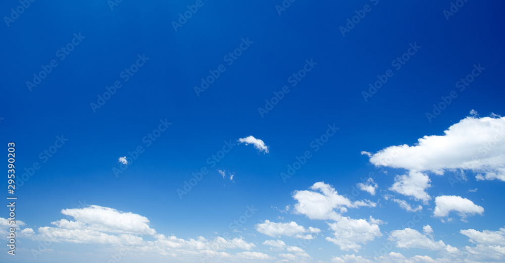 Fotografie Blue sky background with a tiny clouds