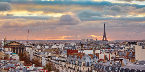 Parisian skyline with the Eiffel tower at sunset