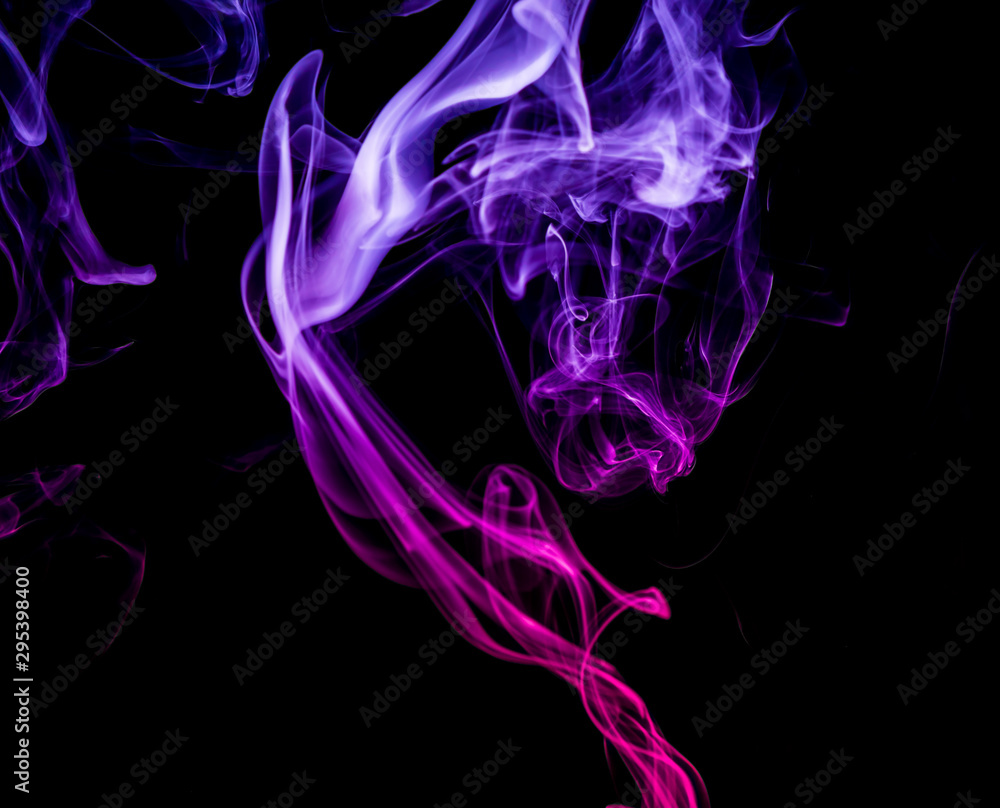 Colored smoke on black background Colored smoke on black background