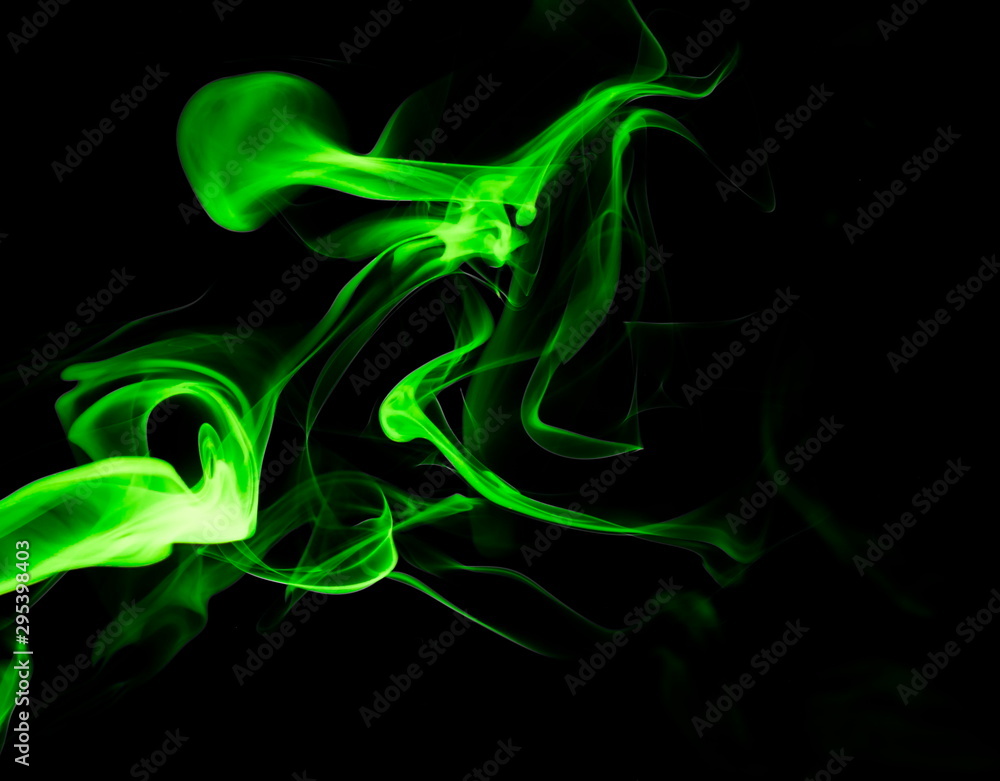 Fototapeta premium Green smoke on black background