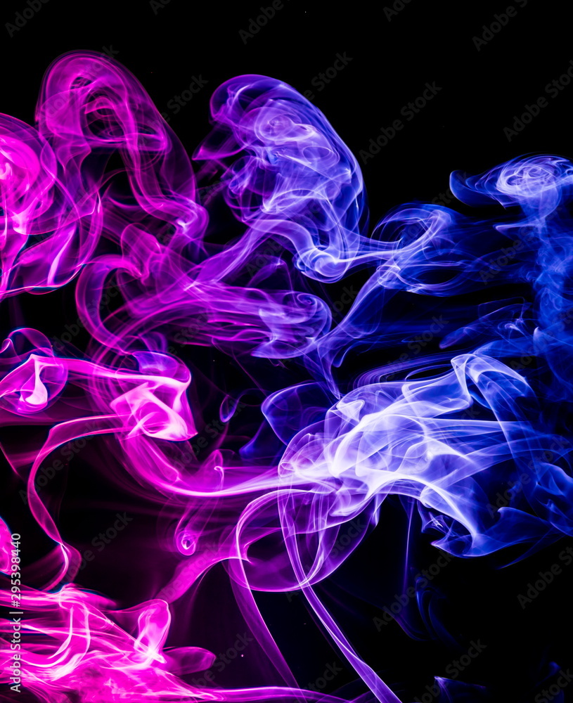Colored smoke on black background Colored smoke on black background