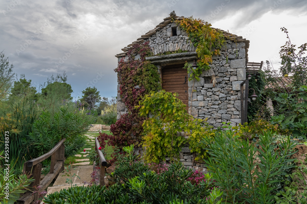 Traditional Dalmatian stone house in ethno village style