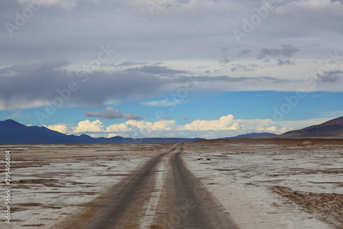 Trail crossing the midst of the frozen desert In the highlands of Bolivia