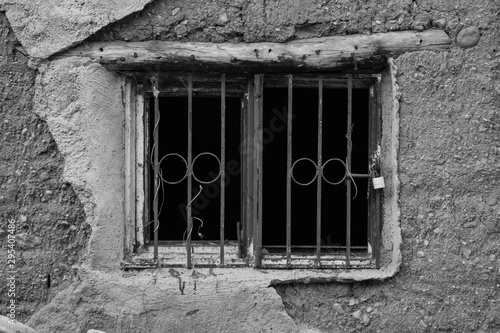 old window on earth wall