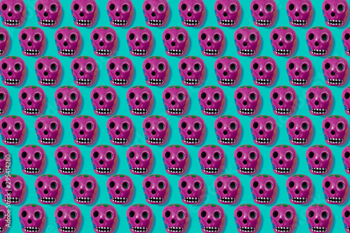 Texture of skulls and colorful handmade skulls of the day of the dead tradition in Mexico