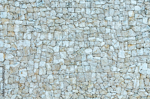 White, beige, gray stone texture wall, bricks, caliche template, background with copy space photo