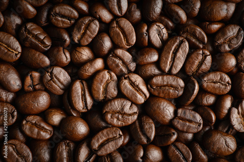 closeup background of roasted arabica coffee beans