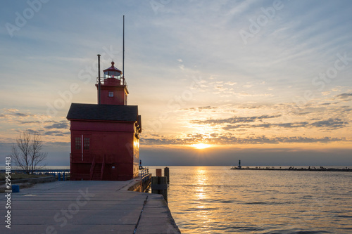 lighthouse glowing at sunset © Walter E Elliott