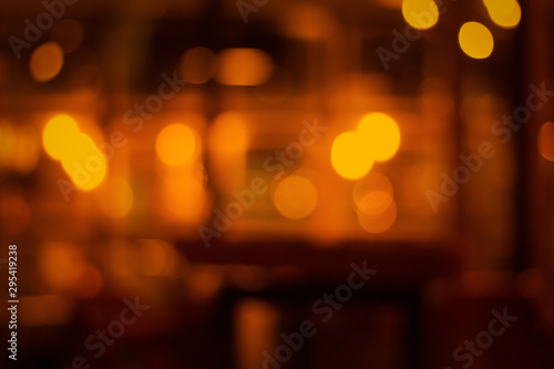 Halloween party abstract night light blur bokeh background.