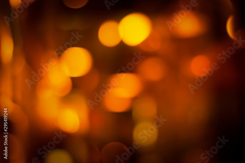 Halloween party abstract night light blur bokeh background.