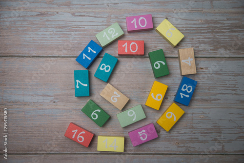 colored cubes with numbers in the shape of a snake