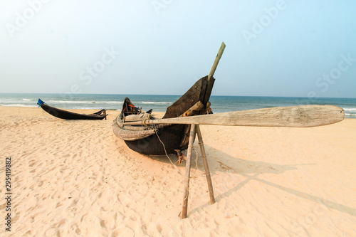 Traditional wooden Vietnamese boat at a beach in Hue, Vietnam