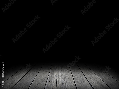 Wooden board empty gray color table in front of black background.Wooden floor space show display.