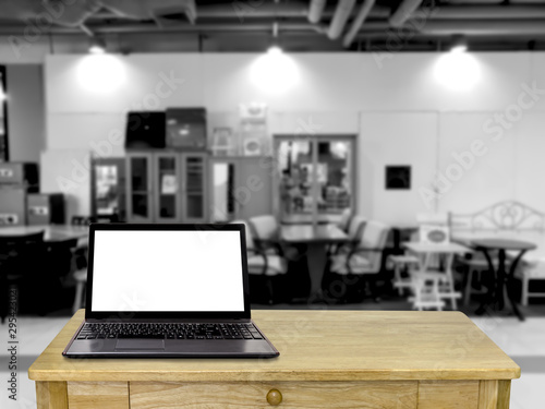 The desk with blur furniture background