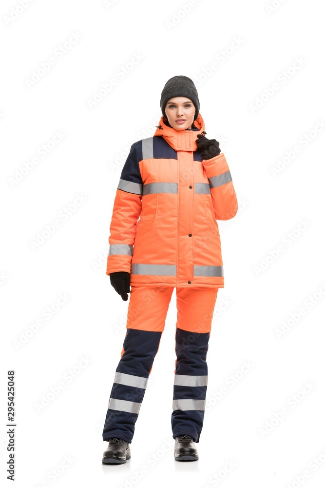 Woman in working clothes and cap isolated shot Woman in working clothes and cap isolated shot