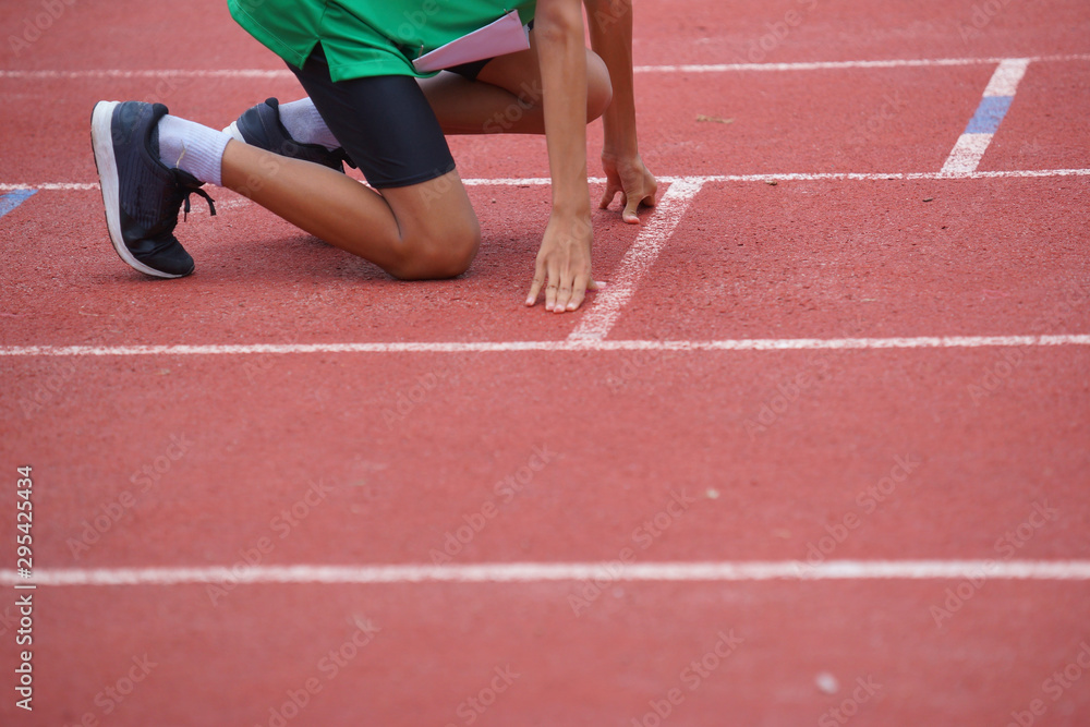 Preparing start on the treadmill  to run outdoor sport.