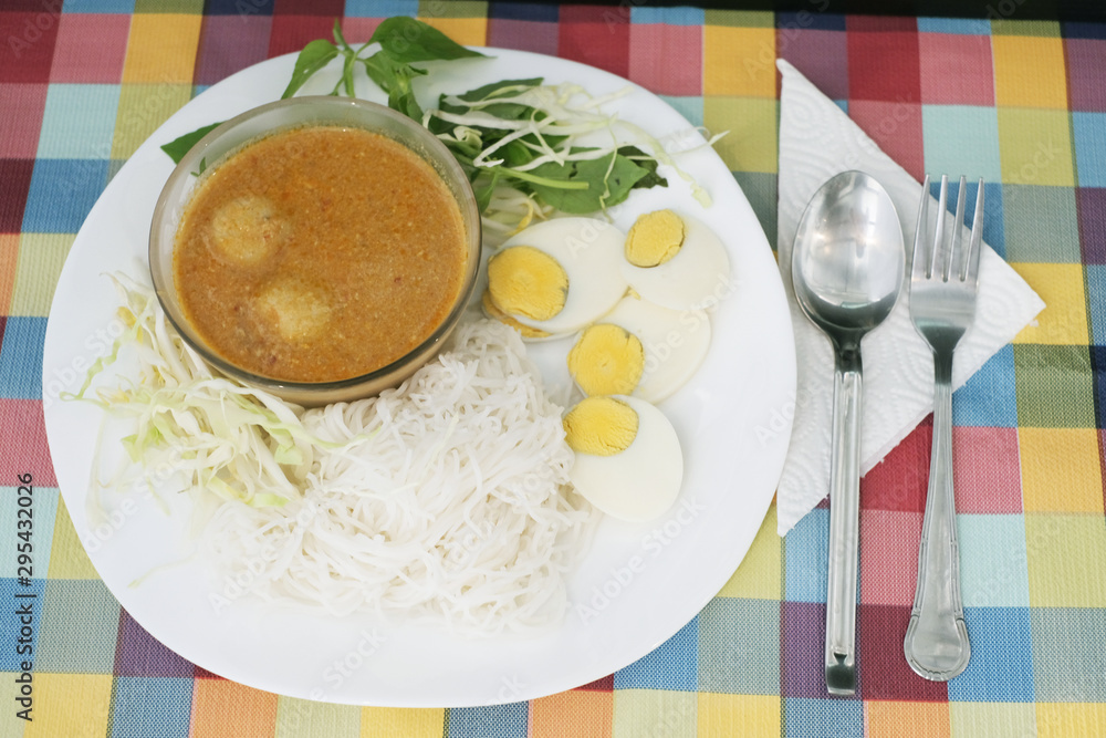 Lunch with rice noodles and curry Lunch with rice noodles and curry