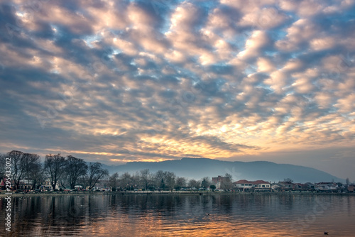 View of lake Pamvotis in Ioannina city at sunset. Greece.