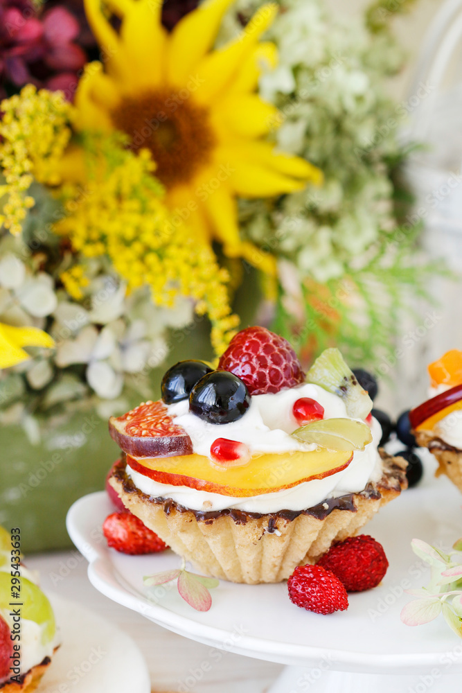 Colorful cupcakes with fresh fruits. Colorful cupcakes with fresh fruits.
