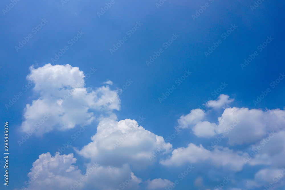 Blue sky with white clouds background Blue sky with white clouds background