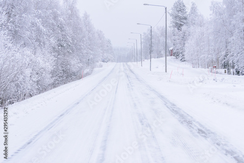 The road number 496 has covered with heavy snow in winter season at Lapland, Finland.