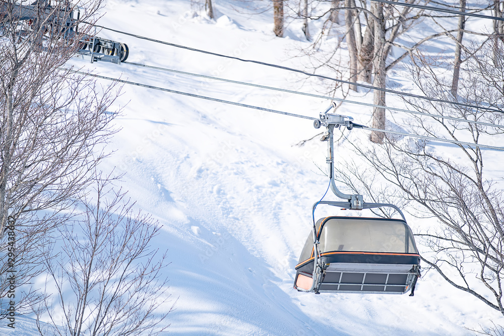 Panoramic view of driving directions With trees and mountains covered in snow Panoramic view of driving directions With trees and mountains covered in snow
