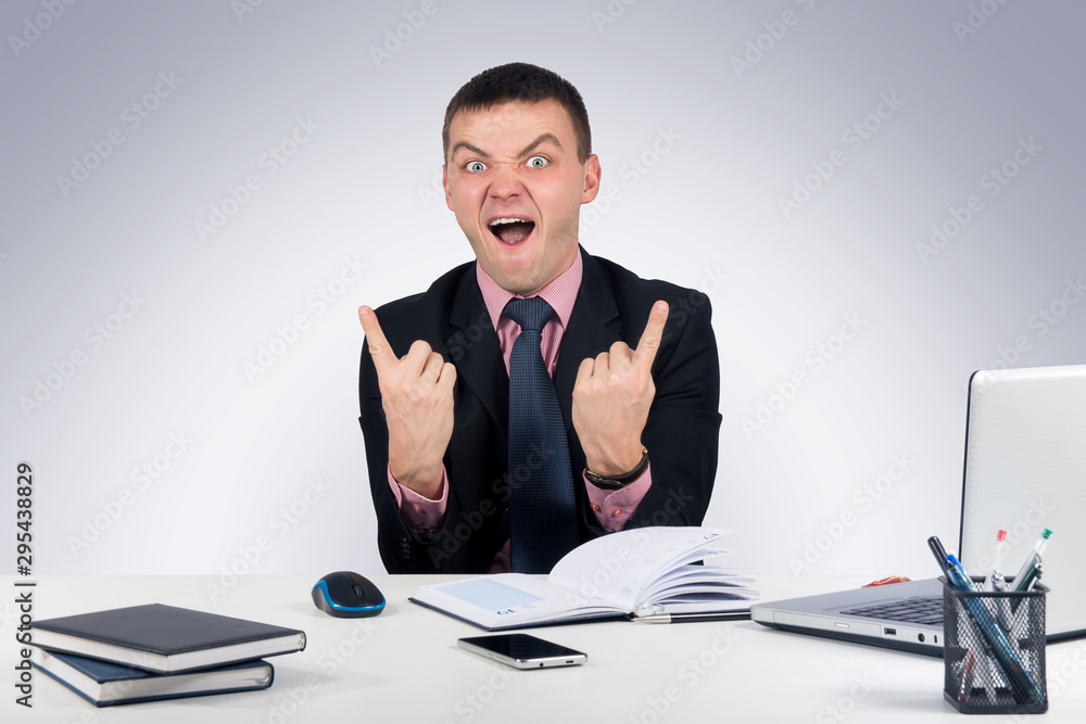 Happy businessman raising his thumbs Happy businessman raising his thumbs