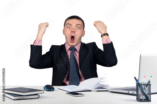 Tableau sur toile Happy energetic businessman with his arms raised isolated on white background