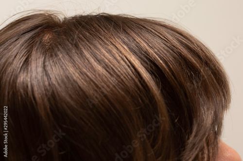 Brown female hair close up