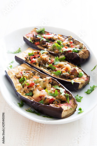 Eggplants stuffed with meat, mushrooms and tomatoes