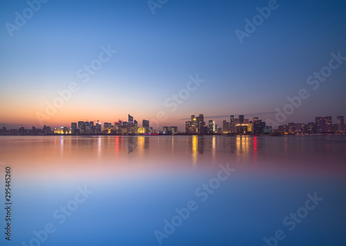 urban skyline and modern buildings at dusk  cityscape of China.