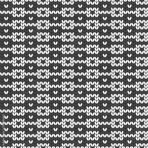 Geometric black and white pattern. Imitation knitting or embroidery. Seamless background. Jacquard.