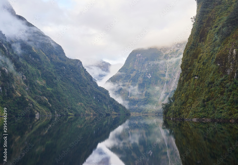 Misty mountain lake in the mountains, New Zealand Misty mountain lake in the mountains, New Zealand