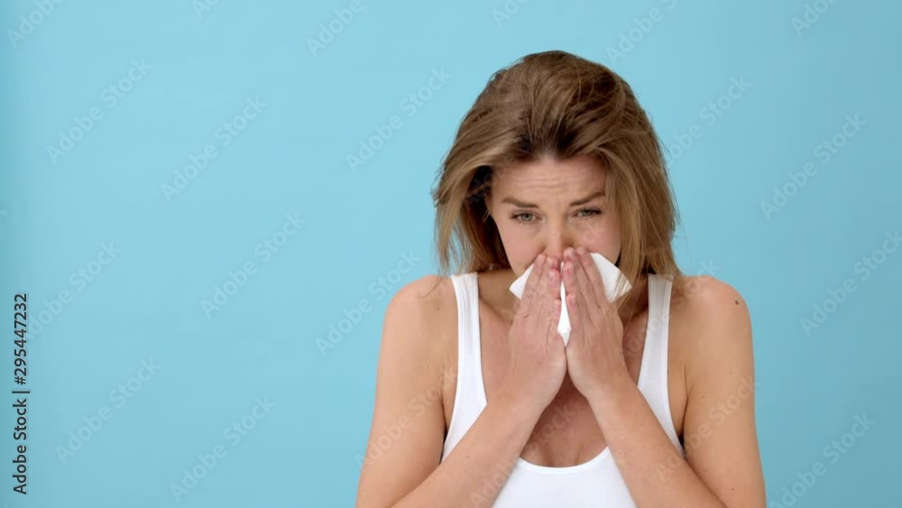 Gorgeous Model in White Top Sneezing while Covering Her Mouth with Handkerchief Gorgeous Model in White Top Sneezing while Covering Her Mouth with Handkerchief