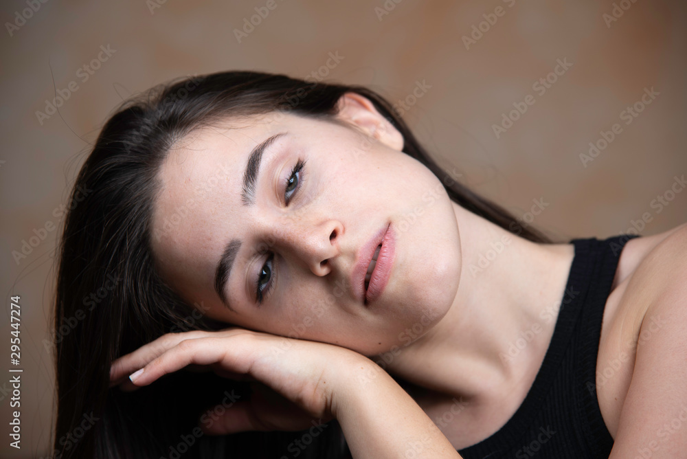 Young girl with sleepy and tired face expression portrait Young girl with sleepy and tired face expression portrait