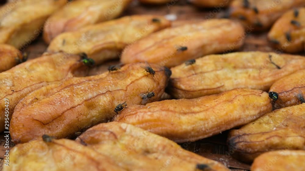 Dried banana with fly. Dried banana with fly.