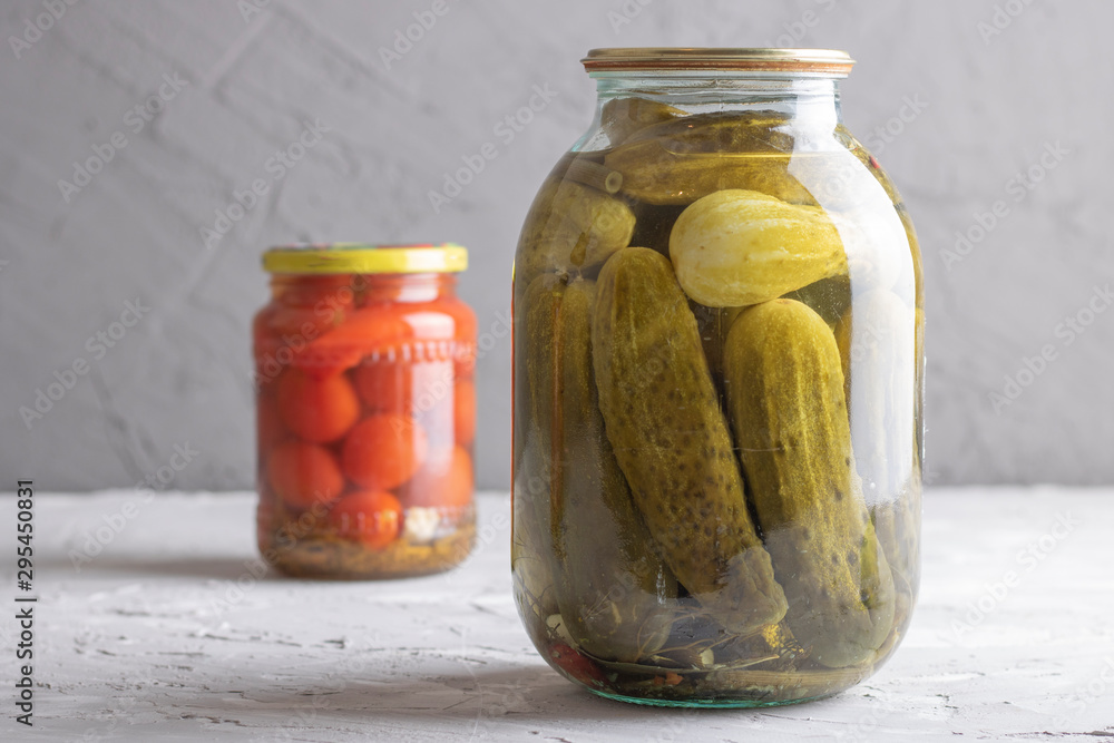 canned cucumbers and tomatoes in jars. Nobody canned cucumbers and tomatoes in jars. Nobody