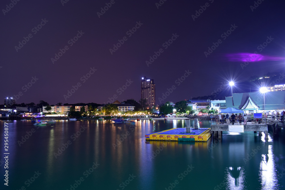 Pattaya Pier At night there is a beautiful light. And there are many boats Waiting for tourists at night Pattaya Pier At night there is a beautiful light. And there are many boats Waiting for tourists at night