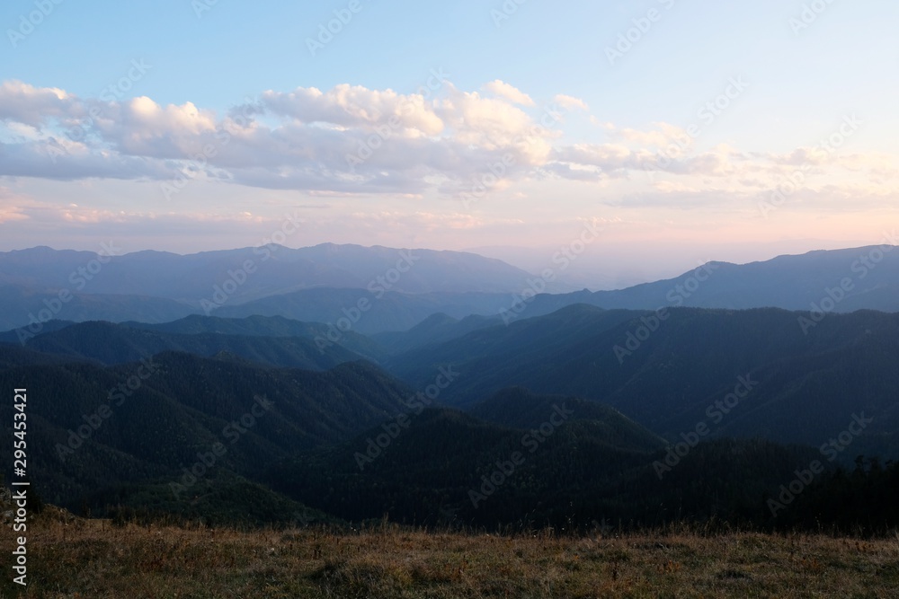View around peak Lomis Mta in Borjomi-Kharagauli National Park, Georgia. Amazing autumn colours in evening sunlight.