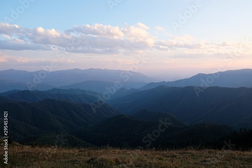 View around peak Lomis Mta in Borjomi-Kharagauli National Park, Georgia. Amazing autumn colours in evening sunlight.