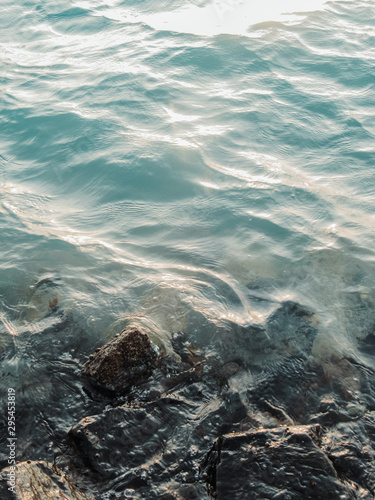 aerial view of waves and rocks