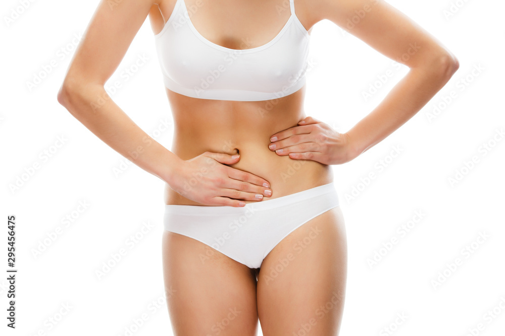 Woman massaging stomach pain Woman massaging stomach pain