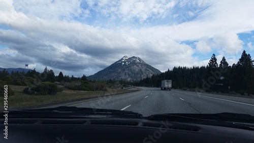 road, highway, landscape, mountain, travel, sky, nature, mountains, asphalt, snow, alaska, blue, canada, scenery, journey, scenic, clouds, summer, route, empty, cloud, country, forest, countryside, to © vicki