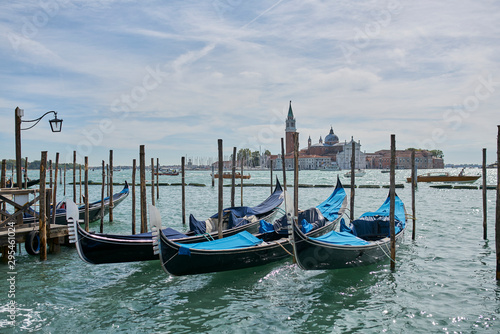 Venice / Italy - September 29th 2019: Gondolier rowing a gondola in Grand Canal