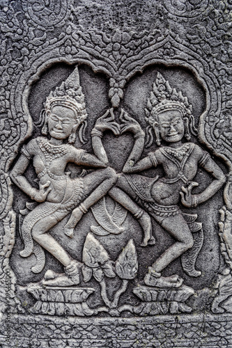 Bas Relief at Bayon temple who explain the life during that era, Siem Reap, Cambodia photo