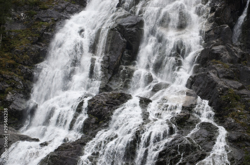 Gigantic beautiful waterfall in the Norwegian mountains. Scenic and moody.